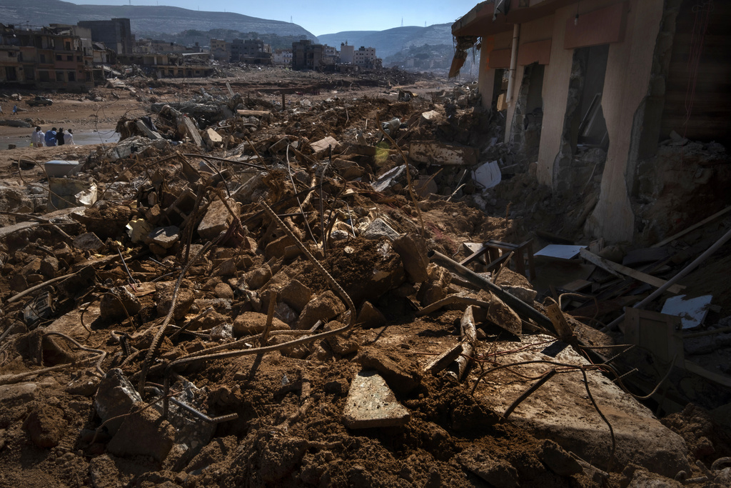A view of the destruction after flooding in Derna, Libya, Saturday, Sept. 16, 2023. Search teams are combing streets, wrecked buildings, and even the sea to look for bodies in Derna, where the collapse of two dams unleashed a massive flash flood that killed thousands of people. (AP Photo/Ricardo Garcia Vilanova)