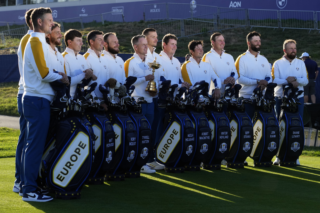 The Europe Ryder Cup team pose on the 1st green for the group photo at the Marco Simone Golf Club in Guidonia Montecelio, Italy, Tuesday, Sept. 26, 2023. The Ryder Cup starts Sept. 29, at the Marco Simone Golf Club. (AP Photo/Andrew Medichini)