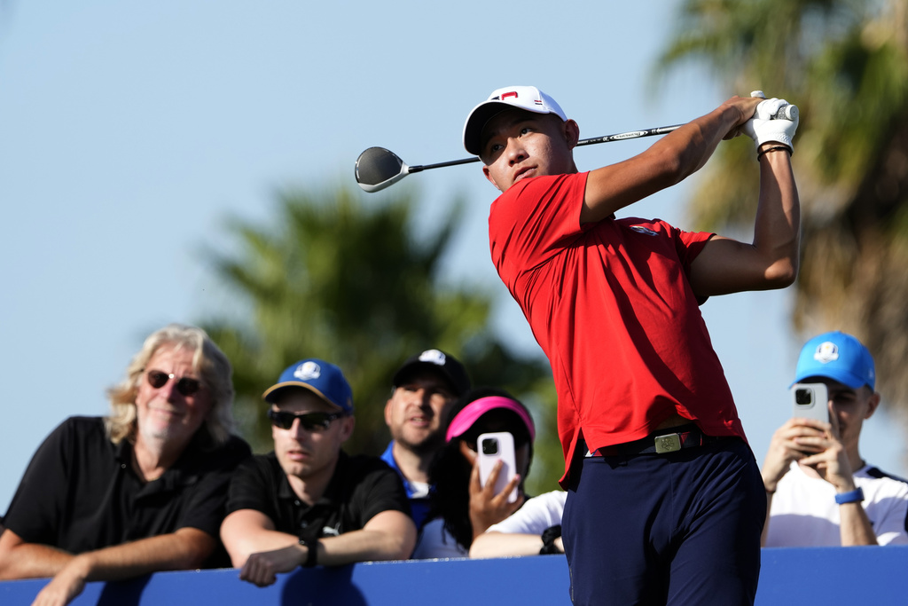United States' Colin Morikawa play his tee shot off the 10th during practice round ahead of the Ryder Cup at the Marco Simone Golf Club in Guidonia Montecelio, Italy, Tuesday, Sept. 26, 2023. The Ryder Cup starts Sept. 29, at the Marco Simone Golf Club. (AP Photo/Alessandra Tarantino)
