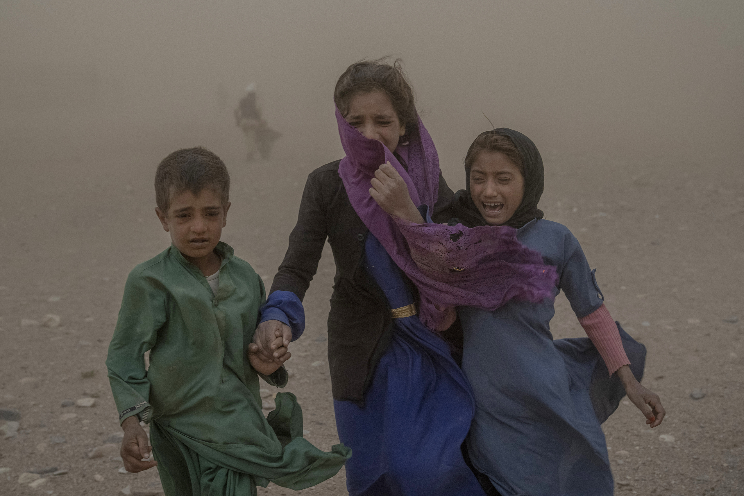 Afghan children carry donated aid to their tents, while they are scared and crying from the fierce sandstorm, after an earthquake in Zenda Jan district in Herat province, western of Afghanistan, Thursday, Oct. 12, 2023. Another strong earthquake shook western Afghanistan on Wednesday morning after an earlier one killed more than 2,000 people and flattened whole villages in Herat province in what was one of the most destructive quakes in the country's recent history. (AP Photo/Ebrahim Noroozi)

Associated Press/LaPresse
Only Italy and Spain