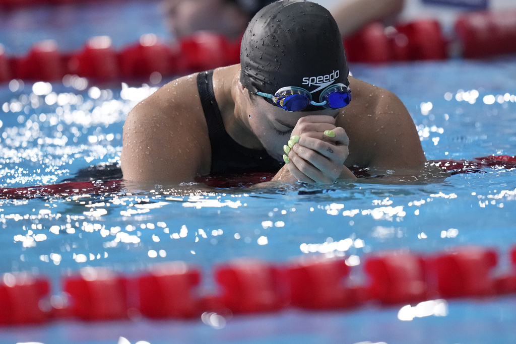 Canada's Mary-Sophie Harvey celebrates winning the last lap in the women's 4 x 100-meters medley relay final at the Pan American Games in Santiago, Chile, Wednesday, Oct. 25, 2023. (AP Photo/Silvia Izquierdo)