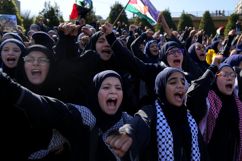 Lebanese students chant slogans during a protest, in front of the headquarters of U.N. Economic and Social Commission for Western Asia (ESCWA) in Beirut, Lebanon, Thursday, Nov. 9, 2023. Hundreds of students gathered to denounce Israel's ongoing attacks on the Gaza Strip and mourn the death of Palestinian children as well as three sisters who were killed in Lebanon over the weekend. (AP Photo/Bilal Hussein)