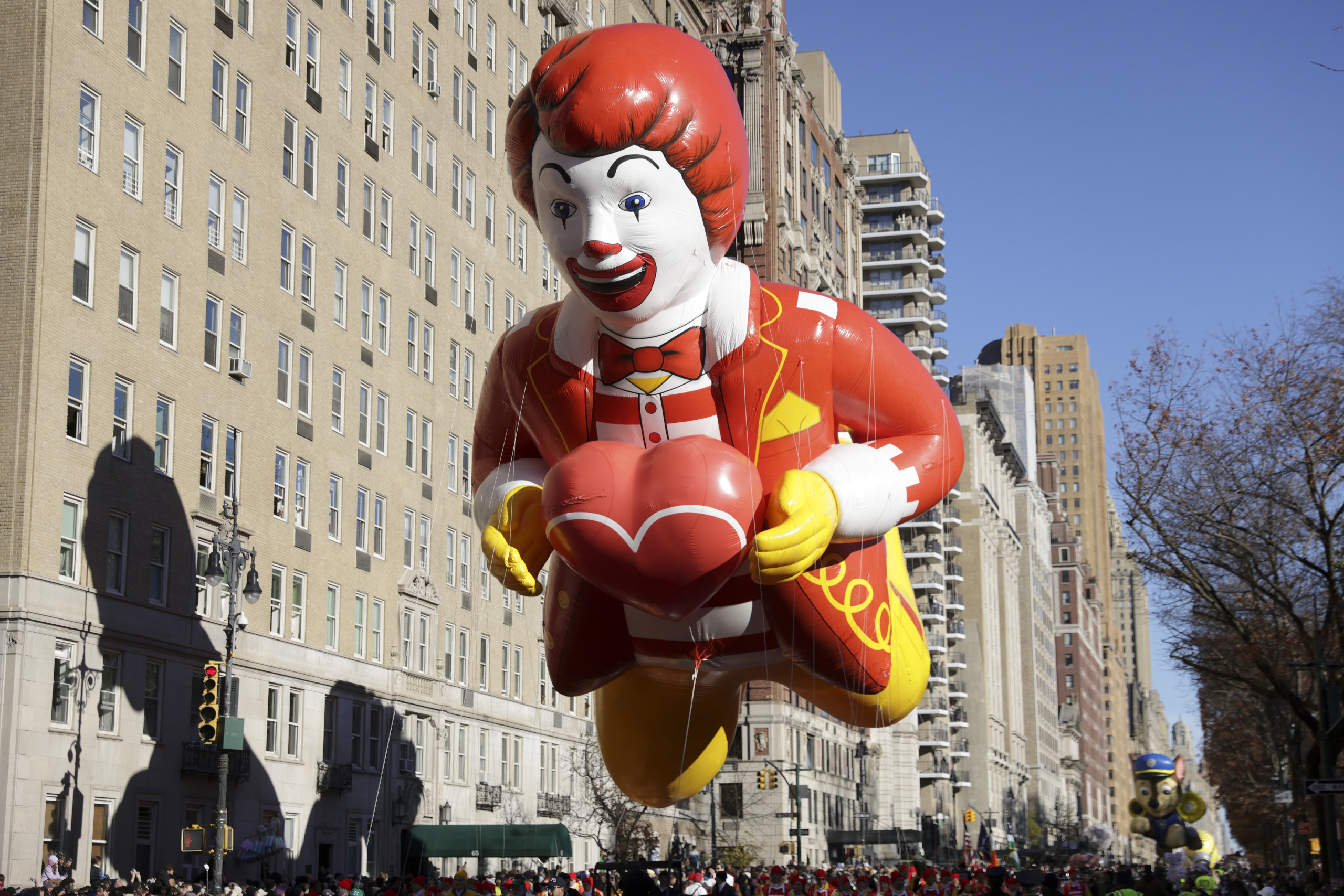 The Ronald McDonald balloon floats by along Central Park West during the Macy's Thanksgiving Day parade, Thursday, Nov. 23, 2023, in New York. (AP Photo/Jeenah Moon)