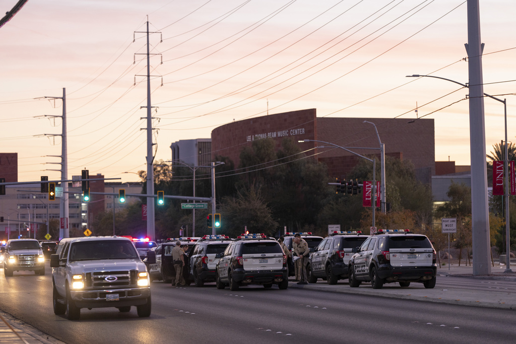 Las Vegas metro police surround the University of Nevada, Las Vegas after an active shooting Wednesday, Dec. 6, 2023, in Las Vegas. (AP Photo/Lucas Peltier)