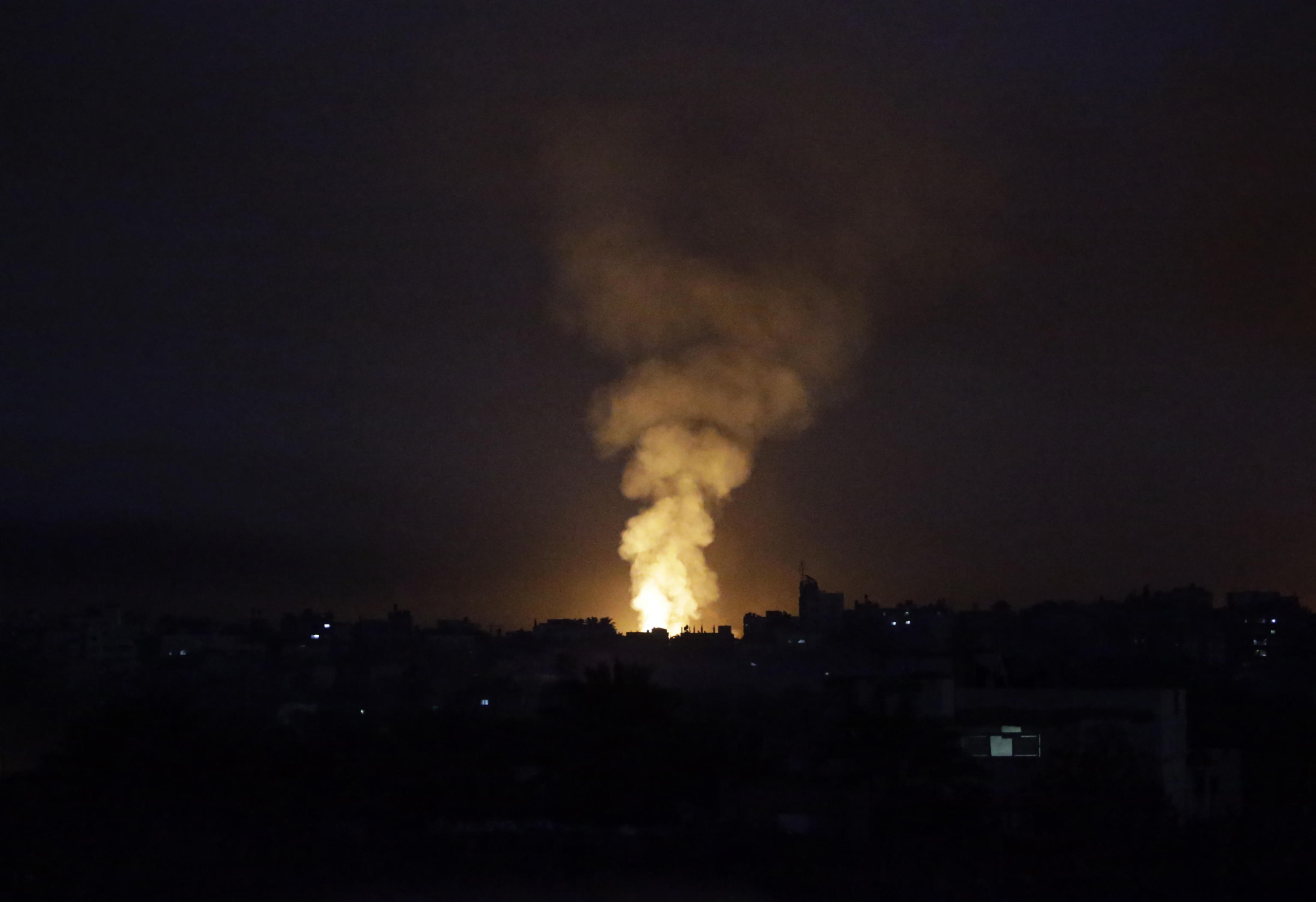 epa11063012 Smoke rises during an Israeli military operation in the east of Al Maghazi, Al Bureije and Al Nusairat refugee camps, southern Gaza Strip, 07 January 2024. More than 22,300 Palestinians and at least 1,300 Israelis have been killed, according to the Palestinian Health Ministry and the Israel Defense Forces (IDF), since Hamas militants launched an attack against Israel from the Gaza Strip on 07 October, and the Israeli operations in Gaza and the West Bank which followed it.  EPA/MOHAMMED SABER