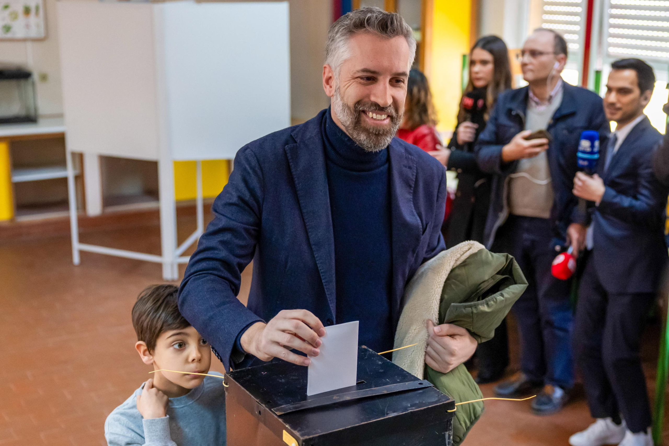 epa11210787 The secretary-general of the Socialist Party (PS), Pedro Nuno Santos, accompanied by his son, casts his ballot in a polling station for the general elections at a school, in Lisbon, Portugal, 10 March 2024. More than 10.8 million Portuguese are expected to vote to elect 230 deputies to the Portuguese Parliament. Eighteen political forces (15 parties and three coalitions) are running in these elections.  EPA/JOSE SENA GOULAO