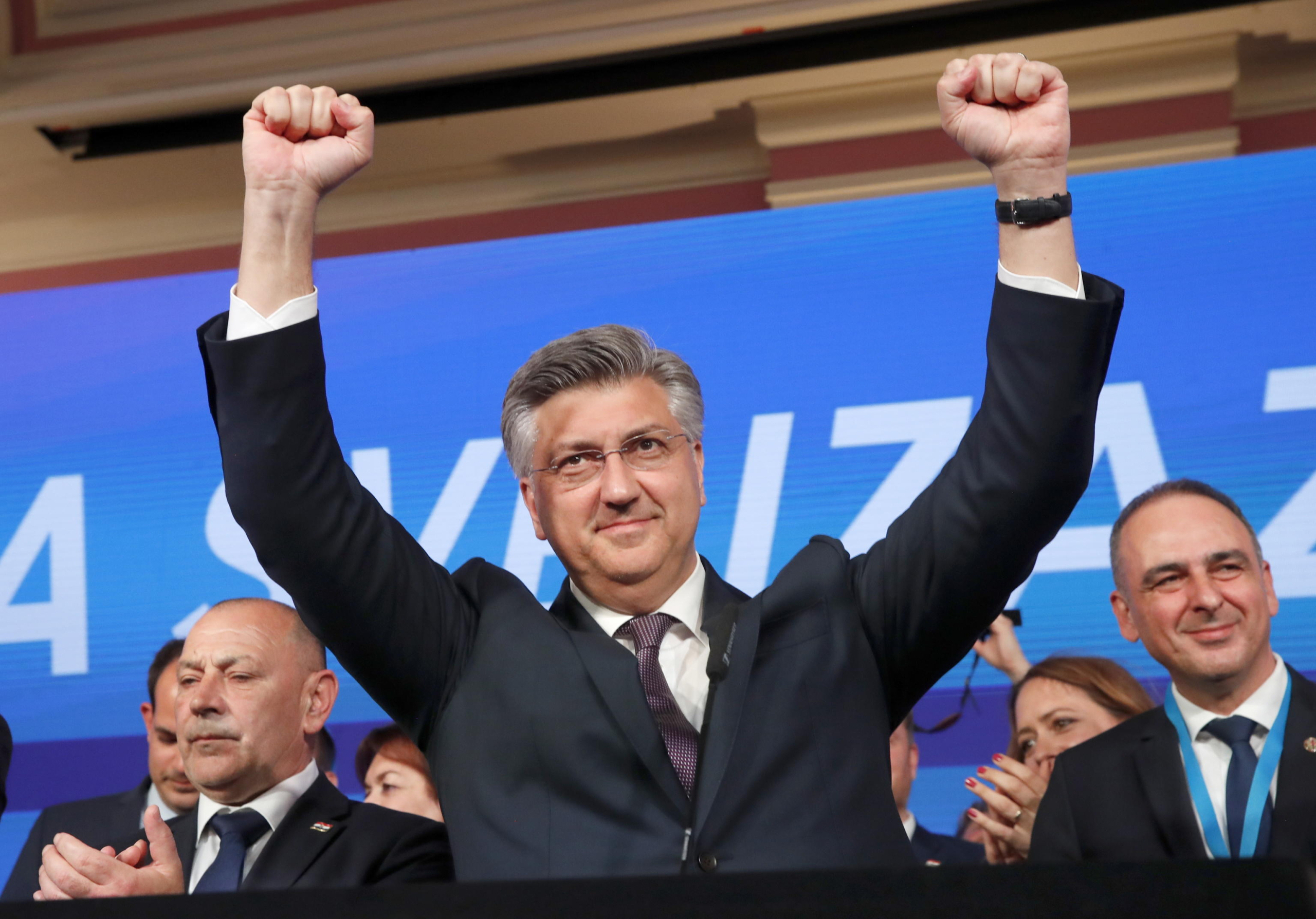 epa11285649 Croatian Prime Minister Andrej Plenkovic from the Croatian Democratic Union (HDZ) reacts to his victory during the Parliamentary elections, at their head quaters in Zagreb, Croatia, 17 April 2024. Voters in the country are casting their ballots to elect 151 members of Sabor, the Parliament of Croatia.  EPA/ANTONIO BAT