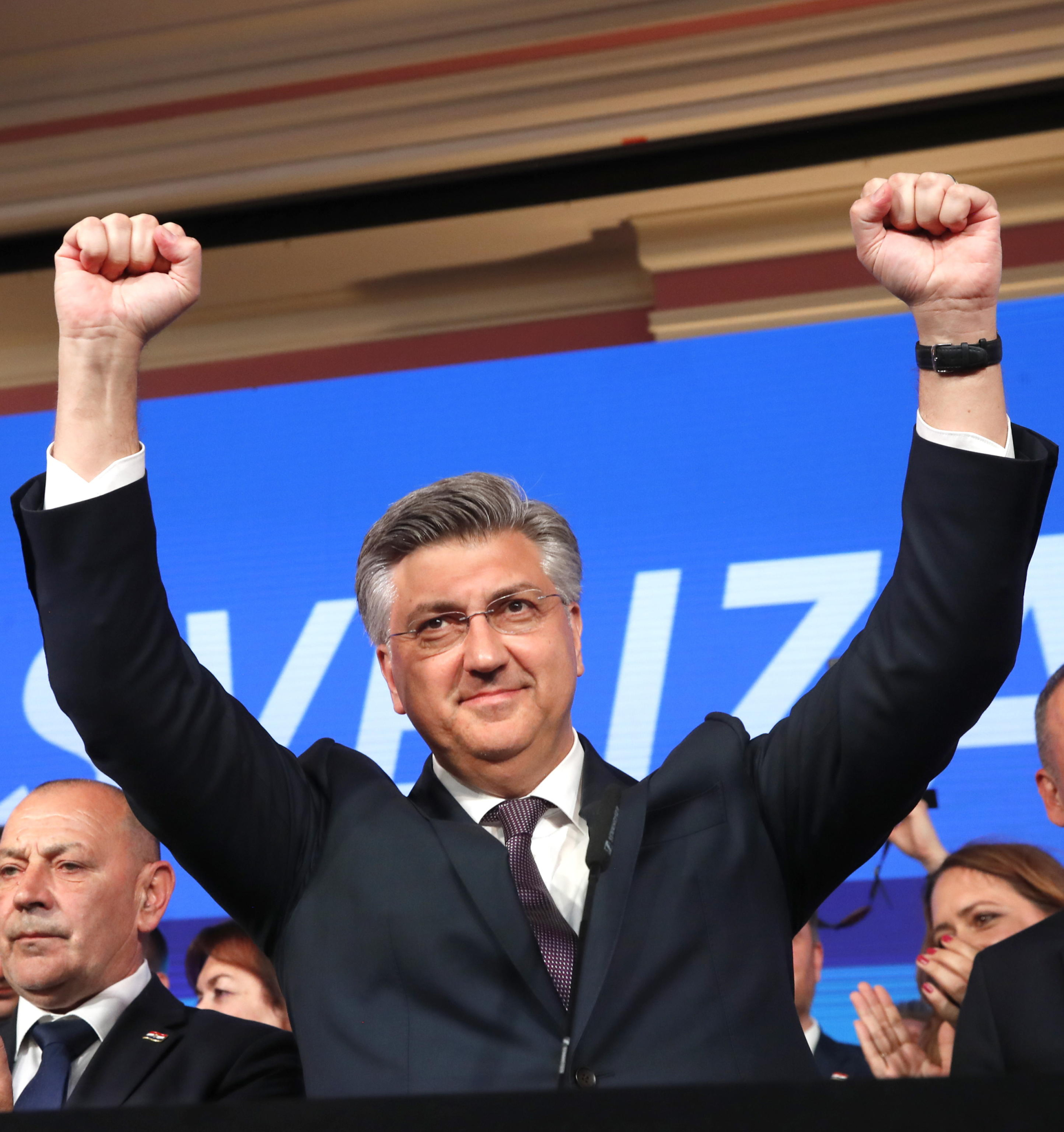 epa11285647 Croatian Prime Minister Andrej Plenkovic from the Croatian Democratic Union (HDZ) reacts to his victory during the Parliamentary elections, at their head quaters in Zagreb, Croatia, 17 April 2024. Voters in the country are casting their ballots to elect 151 members of Sabor, the Parliament of Croatia.  EPA/ANTONIO BAT