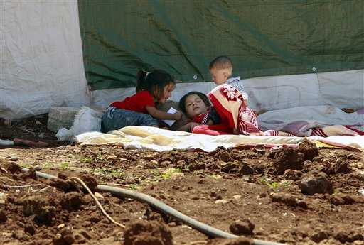 Bambini siriani in un campo profughi in Libano