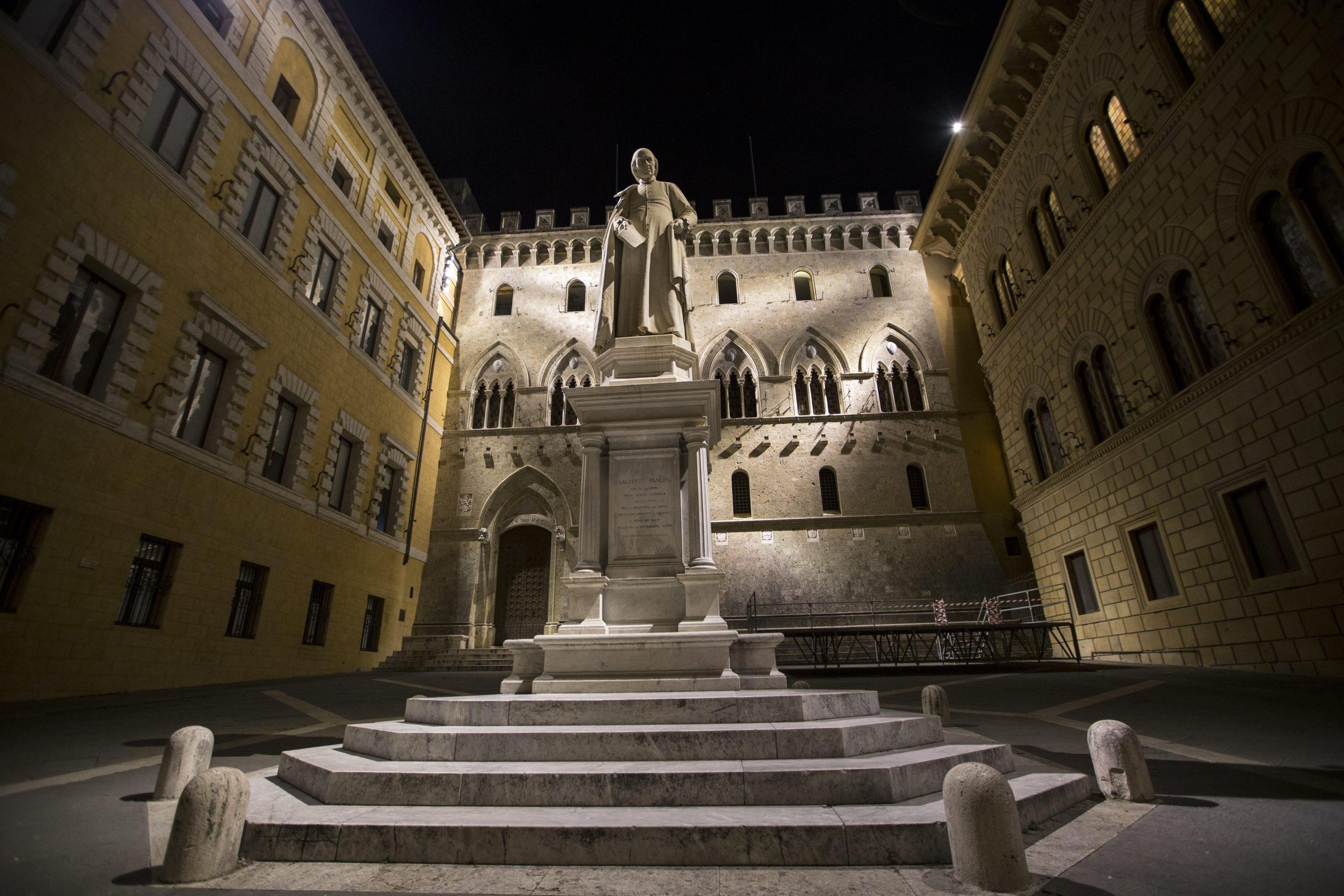 A file photo dated 26 March 2016 showing Sallustio Bandini's monument in front of the Banca Monte dei Paschi di Siena (BMPS or MPS) headquarters, in Piazza Salimbeni (Salinbeni Square), in Siena, Italy. 
ANSA/MATTIA SEDDA