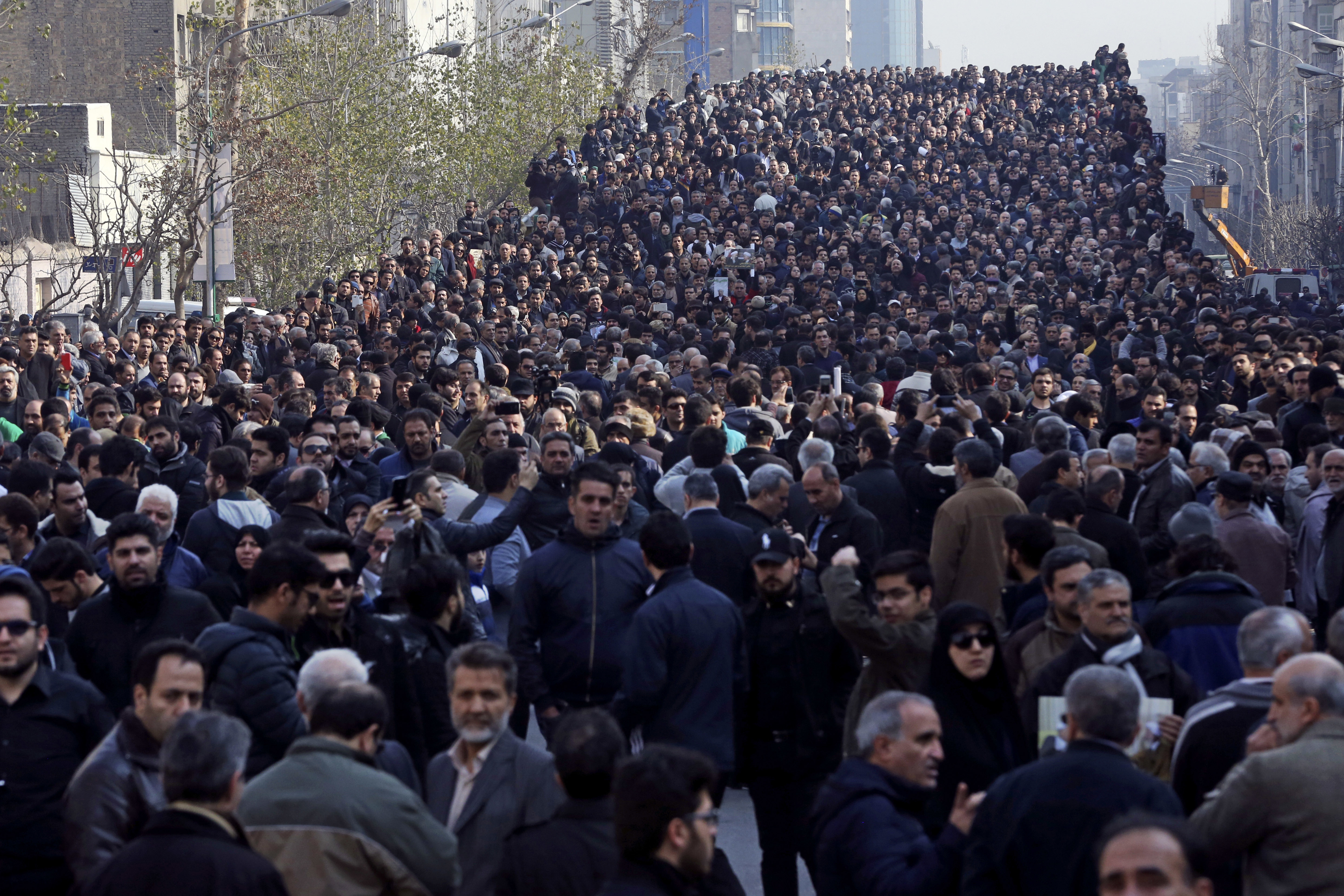 Mourners attend the funeral of former Iranian President Akbar Hashemi Rafsanjani, in Tehran, Iran, Tuesday, Jan. 10, 2017. Hundreds of thousands of mourners have flooded the streets of Tehran, beating their chests and wailing in grief for Rafsanjani, who died over the weekend at the age of 82. The crowds have filled main thoroughfares of the capital as top government and clerical officials held a funeral service at Tehran University. (AP Photo/Vahid Salemi)