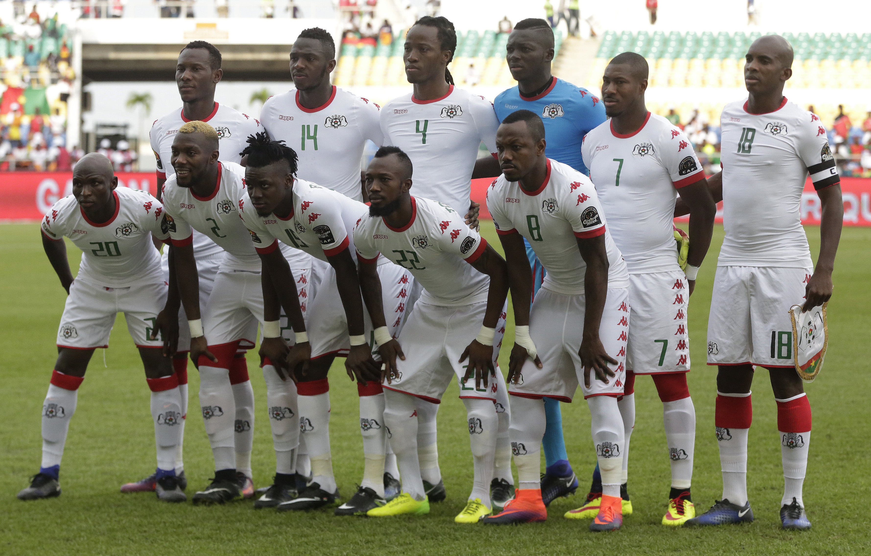 Burkina Faso's, soccer team poses for a group photo before their African Cup of Nations  Quarter Finals soccer match between Tunisia and Burkina Faso. at the Stade de l'Amitie Libreville, Gabon, Saturday, Jan. 28, 2017. (AP Photo/Sunday Alamba)