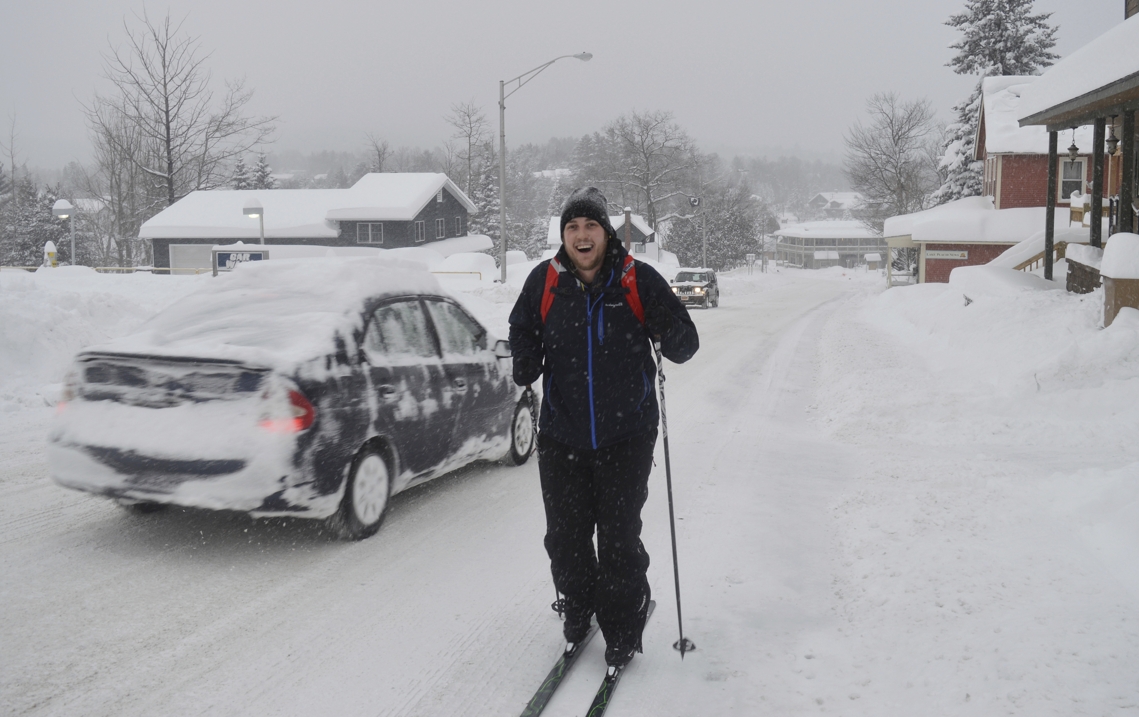 Alex Hudson cross-country skis up Sentinel Road in Lake Placid, New York, Wednesday morning, March 15, 2017, on his way to work.
(Photo — Antonio Olivero, Adirondack Daily Enterprise)