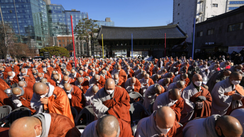 South Korean Buddhist monks participate at a rally at the Jogye temple in Seoul, South Korea, Friday, Jan. 21, 2022. Thousands of Buddhist monks gathered to protest alleged religious discrimination by South Korean government. (AP Photo/Lee Jin-man)