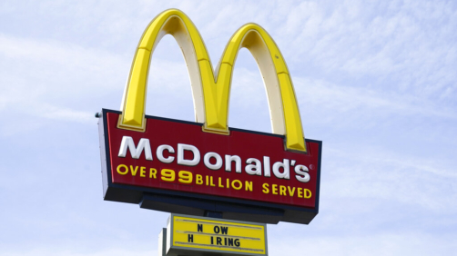 FILE - A sign is displayed outside a McDonald's restaurant, Tuesday, April 27, 2021, in Des Moines, Iowa.  McDonald’s said Tuesday, March 8, 2022,  it is temporarily closing all of its 850 restaurants in Russia in response to the country's invasion of Ukraine. The burger giant said it will continue paying its 62,000 employees in Russia.  (AP Photo/Charlie Neibergall, File)