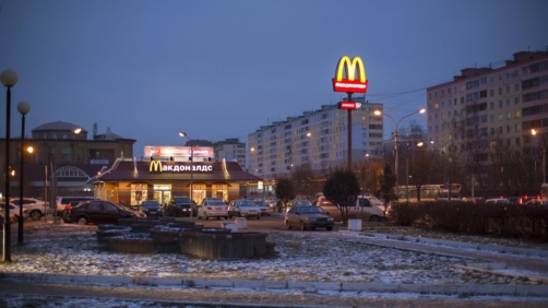 The McDonald's restaurant is seen in the center of Dmitrov, a Russian town 75 km., (47 miles) north from Moscow, Russia, Saturday, Dec. 6, 2014.  The very first McDonald's opened in the Soviet Union 24 years ago. (AP Photo/Alexander Zemlianichenko)