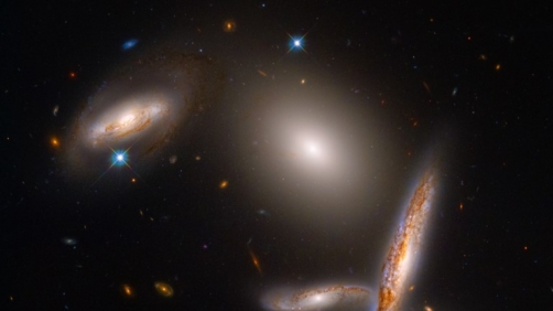 NASA is celebrating the Hubble Space Telescope's 32nd birthday with a stunning look at an unusual close-knit collection of five galaxies, called The Hickson Compact Group 40 - SCIENCE: NASA, ESA, STScI IMAGE PROCESSING: Alyssa Pagan (STScI)