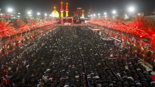 Iraqi Shiites take part in Ashura that marks the martyrdom of Husayn ibn Ali, a grandson of the Islamic prophet Muhammad, and members of his immediate family in the Battle of Karbala, in Karbala, Iraq, Monday, Aug. 8, 2022. (AP Photo/Anmar Khalil)