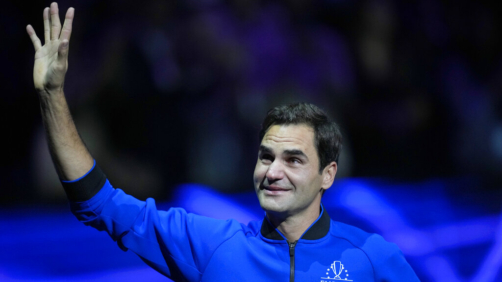 An emotional Roger Federer of Team Europe acknowledges the crowd after playing with Rafael Nadal in a Laver Cup doubles match against Team World's Jack Sock and Frances Tiafoe at the O2 arena in London, Friday, Sept. 23, 2022. Federer's losing doubles match with Nadal marked the end of an illustrious career that included 20 Grand Slam titles and a role as a statesman for tennis. (AP Photo/Kin Cheung)