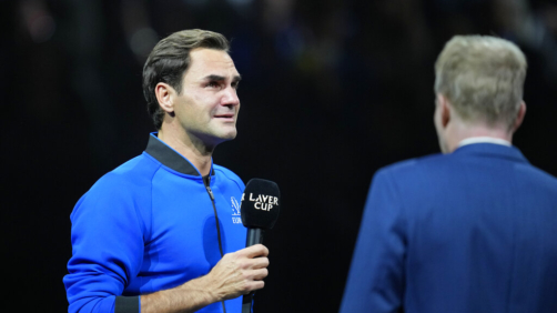 An emotional Roger Federer of Team Europe is interviewed after playing with Rafael Nadal in a Laver Cup doubles match against Team World's Jack Sock and Frances Tiafoe at the O2 arena in London, Friday, Sept. 23, 2022. Federer's losing doubles match with Nadal marked the end of an illustrious career that included 20 Grand Slam titles and a role as a statesman for tennis. (AP Photo/Kin Cheung)