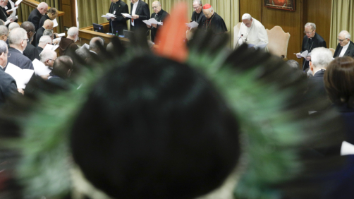 Pope Francis leads a prayer at the opening of a session of the Amazon synod, at the Vatican, Tuesday, Oct. 8, 2019. Pope Francis is holding a three-week meeting on preserving the rainforest and ministering to its native people as he fended off attacks from conservatives who are opposed to his ecological agenda. (AP Photo/Andrew Medichini)