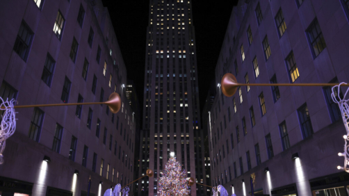 The Rockefeller Center Christmas tree stand illuminated following the 90th annual lighting ceremony, Wednesday, Nov. 30, 2022, in New York. (AP Photo/Julia Nikhinson)