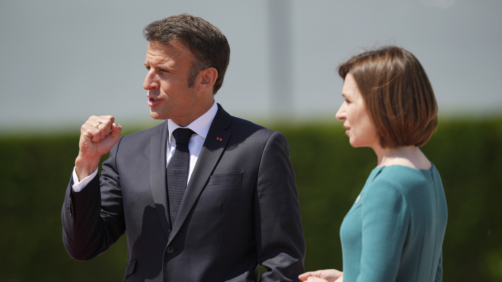 Moldova's President Maia Sandu, right, greets France's President Emmanuel Macron during arrivals for the European Political Community Summit at the Mimi Castle in Bulboaca, Moldova, Thursday, June 1, 2023. Leaders are meeting in Moldova Thursday for a summit aiming to show a united front in the face of Russia's war in Ukraine and underscore support for the Eastern European country's ambitions to draw closer to the West and keep Moscow at bay. (AP Photo/Vadim Ghirda)