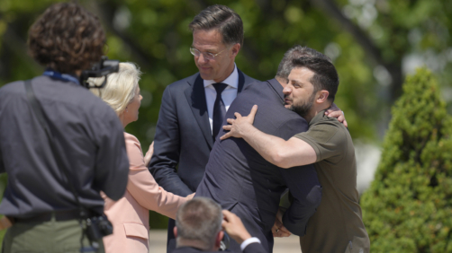 Ukraine's President Volodymyr Zelenskyy, right, greets Luxembourg's Prime Minister Xavier Bettel, second right, after a group photo during the European Political Community Summit at the Mimi Castle in Bulboaca, Moldova, Thursday, June 1, 2023. Leaders are meeting in Moldova Thursday for a summit aiming to show a united front in the face of Russia's war in Ukraine and underscore support for the Eastern European country's ambitions to draw closer to the West and keep Moscow at bay. (AP Photo/Vadim Ghirda)