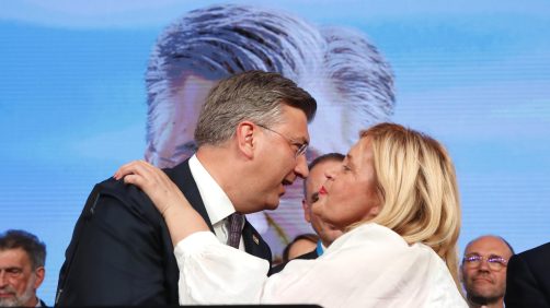 epa11285648 Croatian Prime Minister Andrej Plenkovic (L) from the Croatian Democratic Union (HDZ) reacts to his victory with a supporter during the Parliamentary elections, at their head quaters in Zagreb, Croatia, 17 April 2024. Voters in the country are casting their ballots to elect 151 members of Sabor, the Parliament of Croatia.  EPA/ANTONIO BAT
