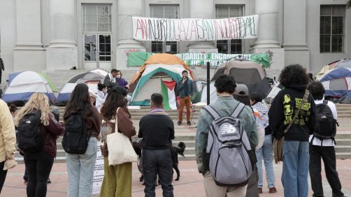 epa11296677 Students listen to a speaker at the University of California Berkeley (UC Berkeley) as students occupy an encampment of tents in front of Sproul Hall, the campus administration building, as they protest UC Berkeleys investment ties to Israel in Berkeley, California, USA, 23 April 2024. More than 34,000 Palestinians and over 1,450 Israelis have been killed, according to the Palestinian Health Ministry and the Israel Defense Forces (IDF), since Hamas militants launched an attack against Israel from the Gaza Strip on 07 October 2023, and the Israeli operations in Gaza and the West Bank which followed it.  EPA/JOHN G. MABANGLO