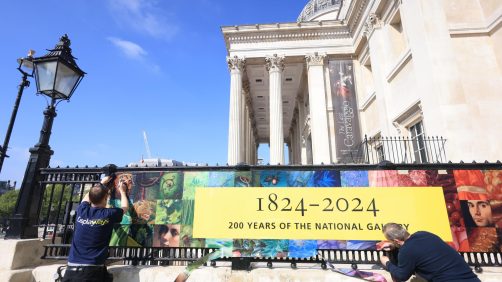 epa11328626 Birthday banners are hung on the National Gallery in London, Britain, 08 May 2024 (issued 09 May 2024). On 10 May 2024 the National Gallery celebrates its Bicentenary. The National Gallery was established in 1824 with the first 38 paintings donated by banker John Julius Angerstein. The collection was initially displayed in a townhouse at 100 Pall Mall. After this became too small,  a new building was completed on Trafalgar Square in 1838 designed by the architect William Wilkins. The art collection currently comprises 2,300 works, spanning the major traditions of Western European painting with works by Van Gogh, Caravaggio, Turner, Constable, Michelangelo, Velazquez and Rembrandt. The National Gallery building welcomed over three million visitors in 2023,  which is open 361 days a year, free of charge. The National Gallery will mark the bicentenary year with 12 months of events celebrating art and creativity across the UK.  EPA/NEIL HALL  ATTENTION: This Image is part of a PHOTO SET
