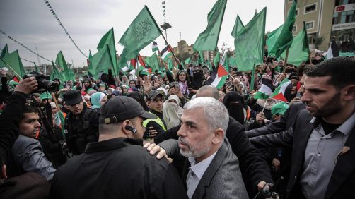 epa07235539 Hamas Gaza leader Yahya Al Sinwar (C) arrives for a Hamas rally to mark the 31st anniversary of the group, in Gaza City, Gaza Strip, 16 December 2018. Hamas was founded in 1987, shortly after the Palestinian Intifada (uprising) broke out against the Israeli occupation of the West Bank and Gaza.  EPA/MOHAMMED SABER